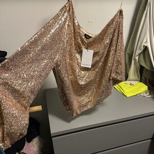 Perfect Holiday sparkly one sleeve top!